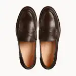 Dark brown vegetable-tanned leather penny loafers with leather soles