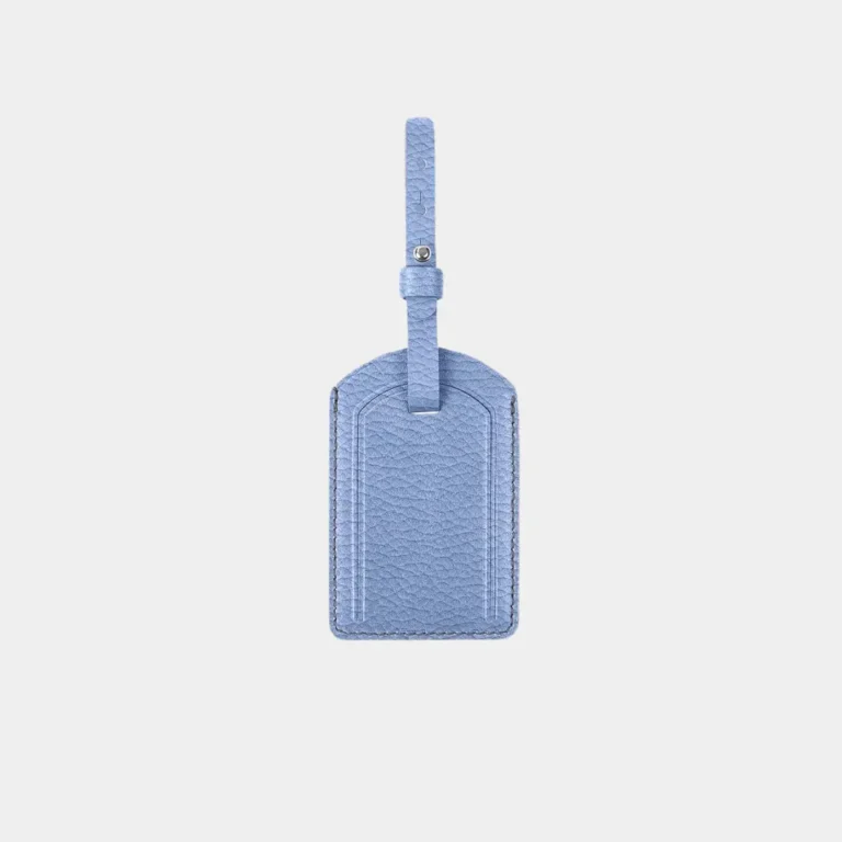 Light blue grained leather luggage tag made in Italy