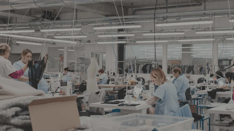 A bright apparel workshop in Italy with machinists at work