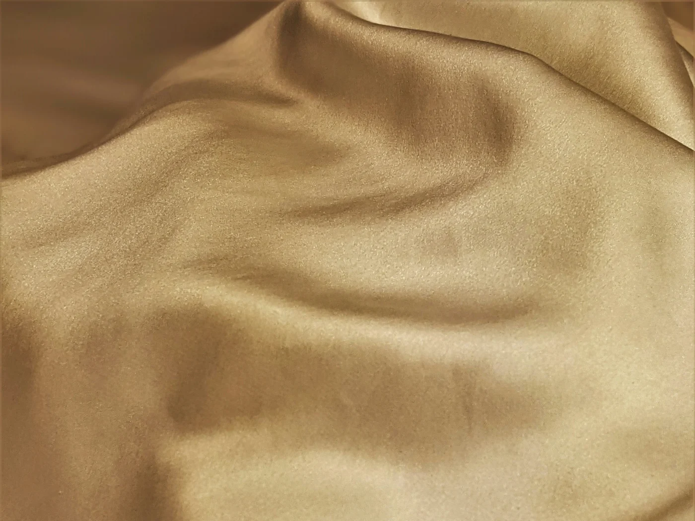 Gold silky and luxurious fabric.