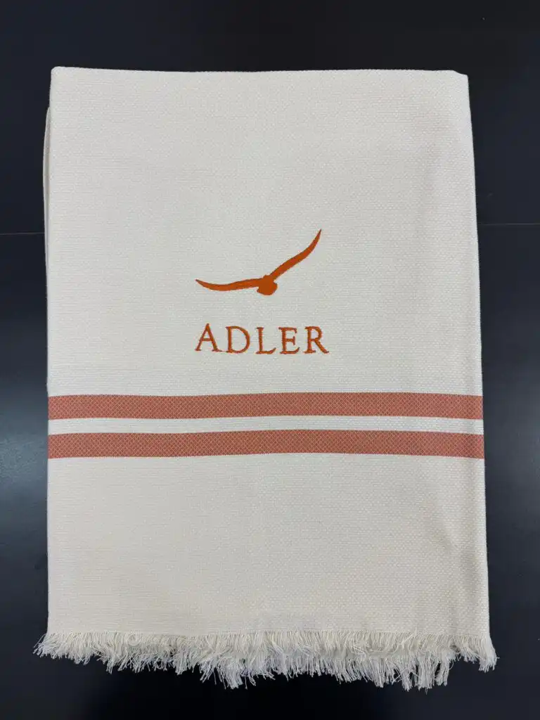 ADLER branded beach towel made in Italy as an employee gift