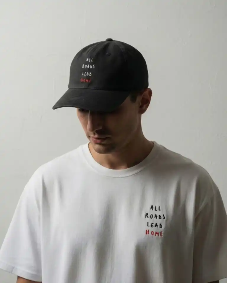 Engel and Völkers All Roads Lead Home t-shirt and cap made in Italy