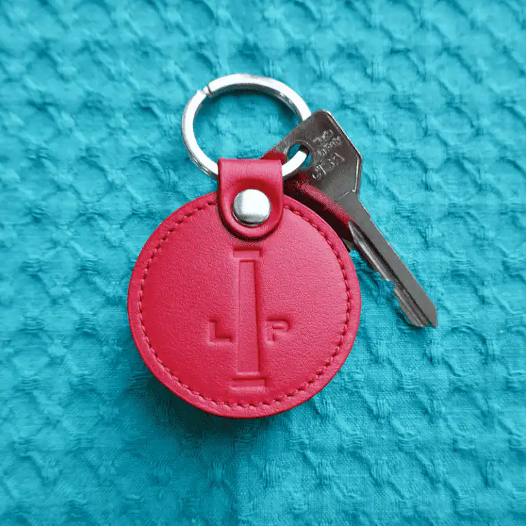 Red leather keyring for Lausanne Palace made in Italy