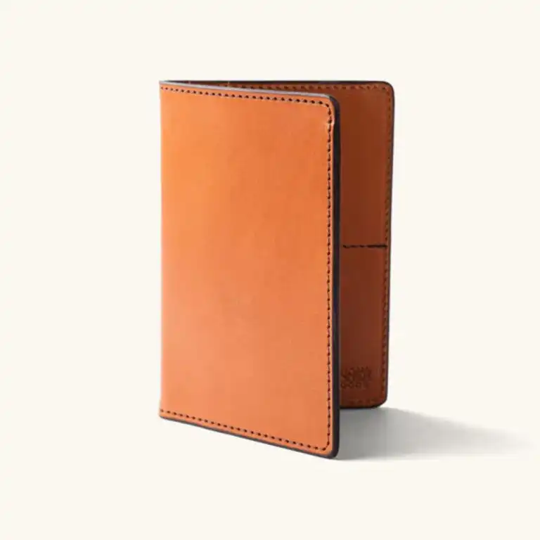 Cognac leather vertical bifold wallet made in Italy