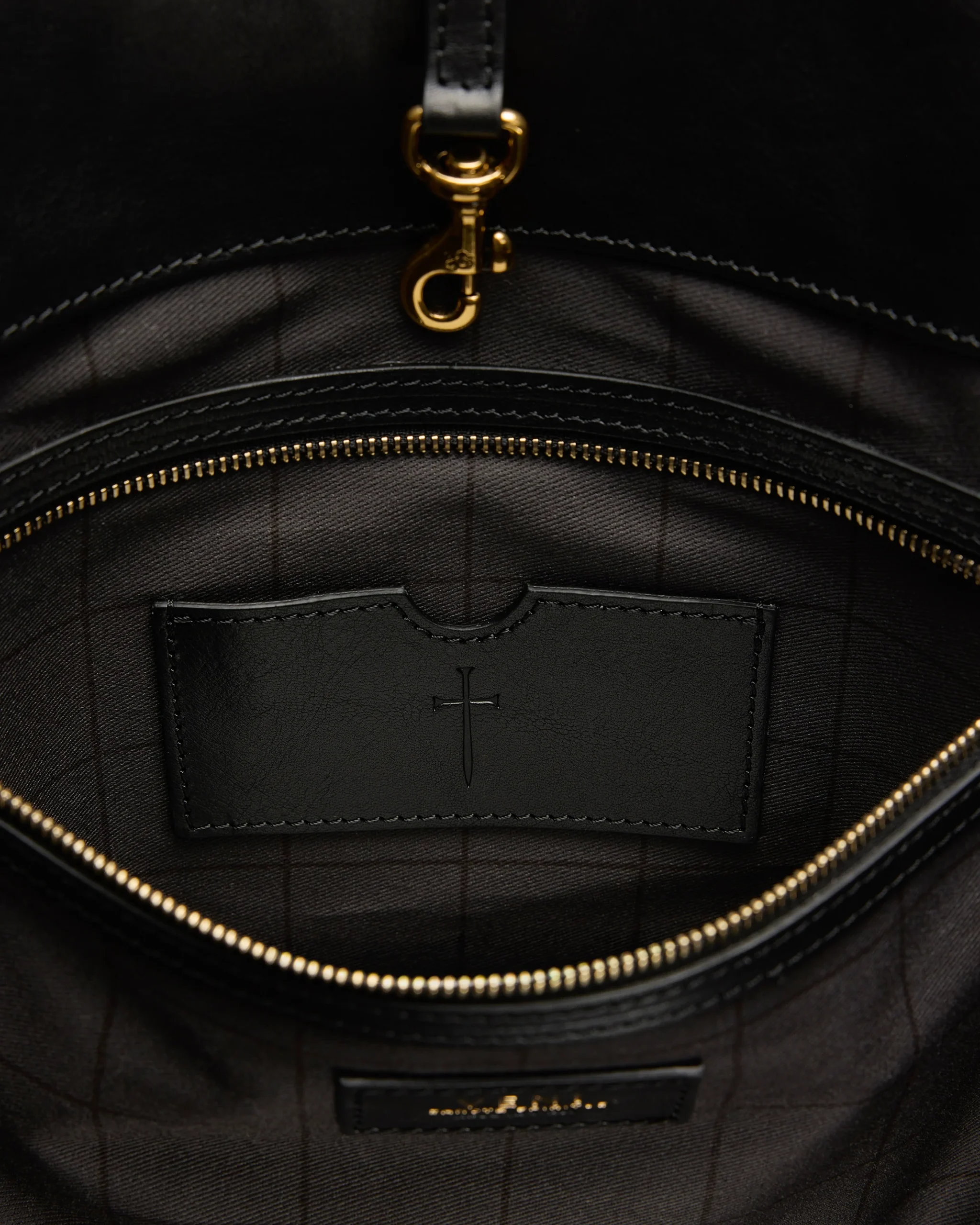 Rebekah tote interior: custom grid-printed lining and removable leather pocket