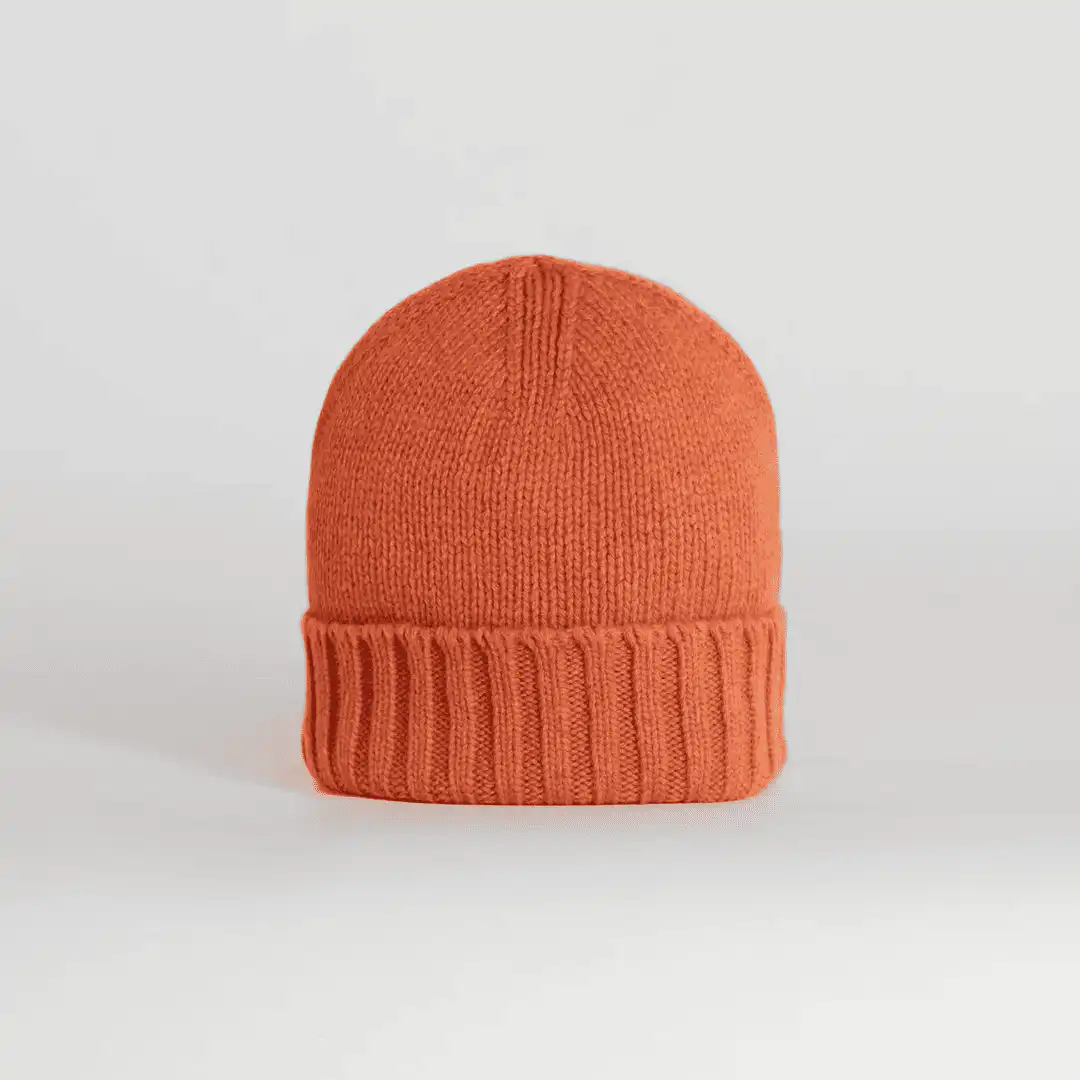 Orange knitted beanie with a ribbed cuff, made in Italy