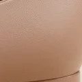 Close-up of nappa leather with a stitched edge